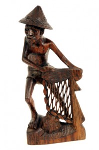 An intricately hand carved wooden fisherman from Bali - 0106